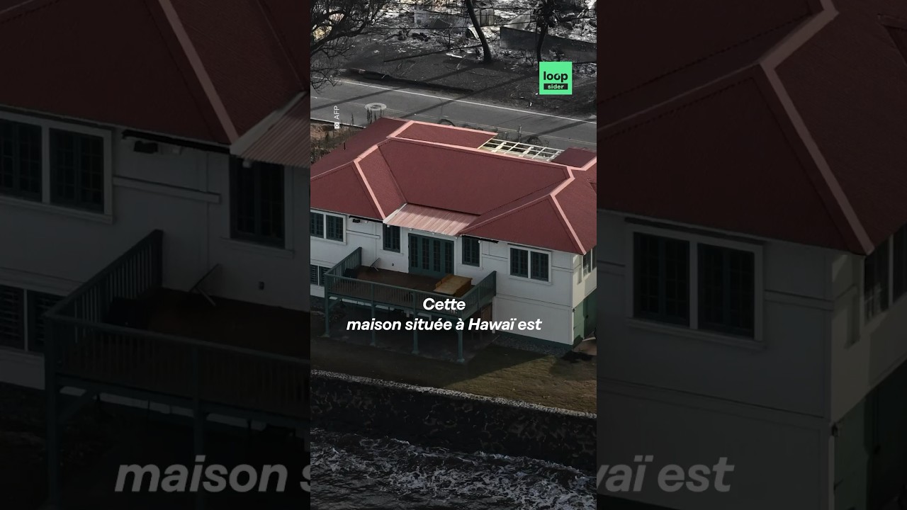 Entourée d’habitations réduites en cendres, une maison a survécu aux feux qui ont sur l’île de Maui.