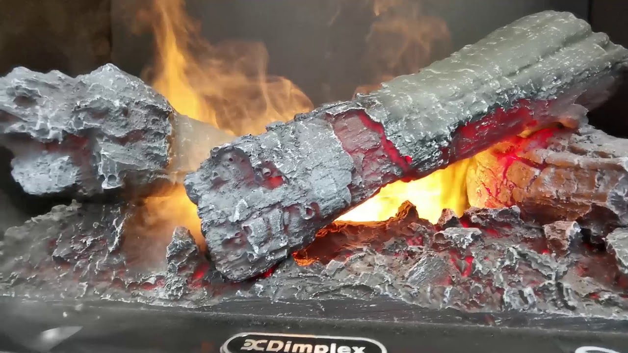 Superbe cheminée électrique disponible chez Leroy Merlin avec de la vrai fumée.Meilleur effet visuel